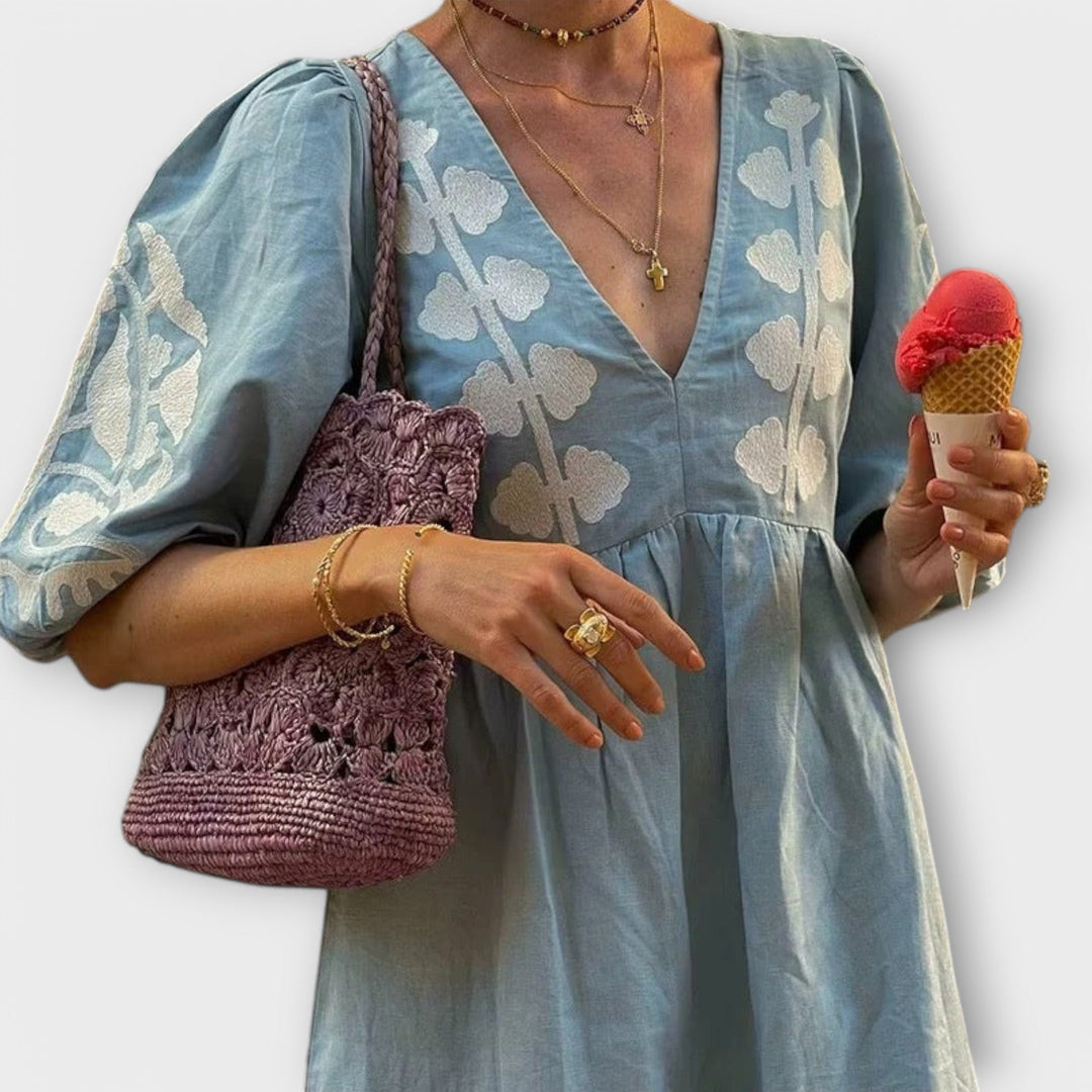 Rena - Bedruckts Chleid für mühelosi Eleganz