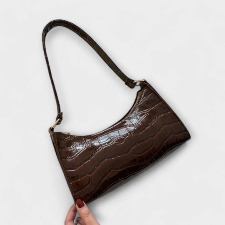 Léora. Glänzendi Ledertasche