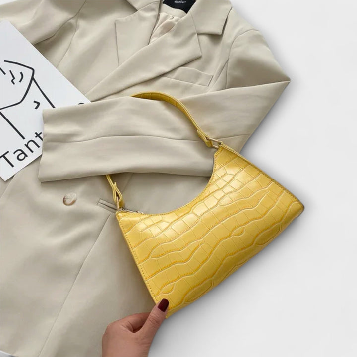 Léora. Glänzendi Ledertasche