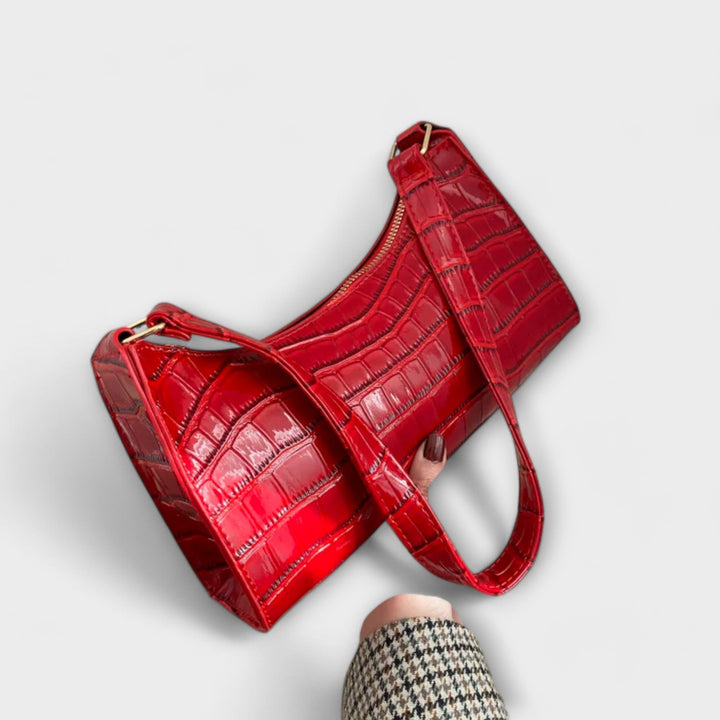 Léora. Glänzendi Ledertasche