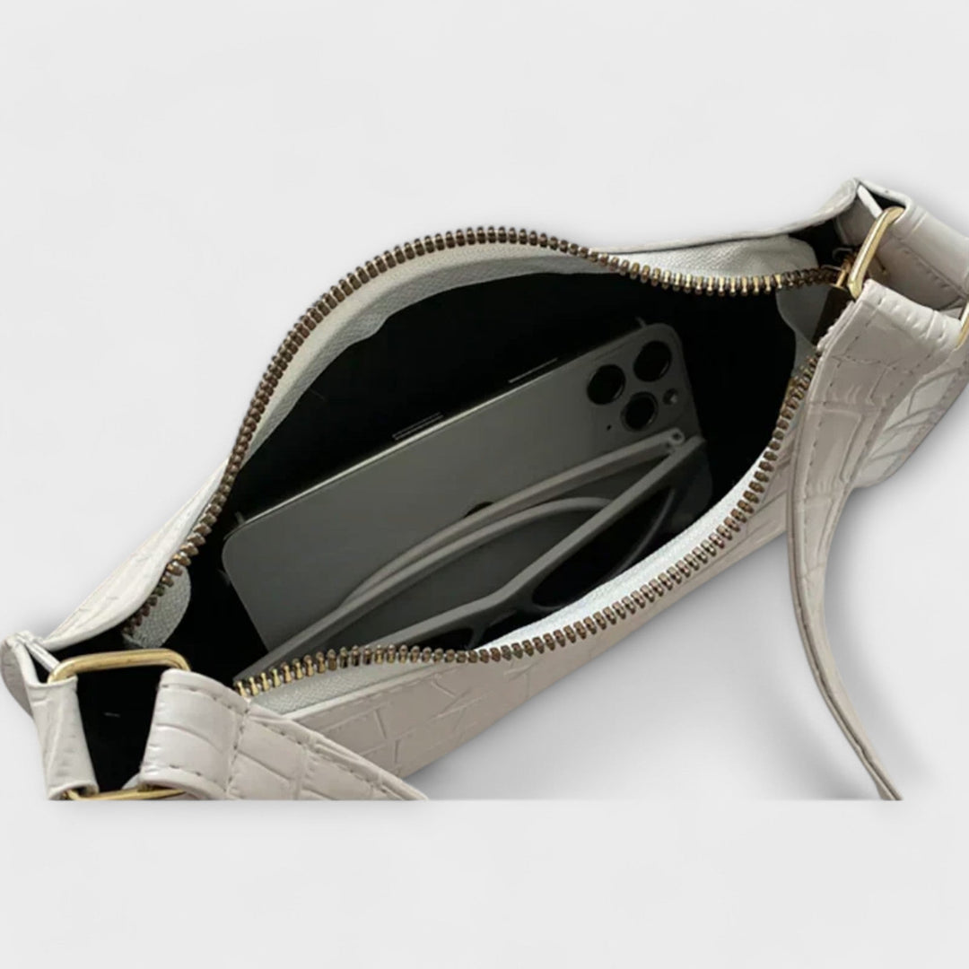 Léora. Glänzendi Ledertasche