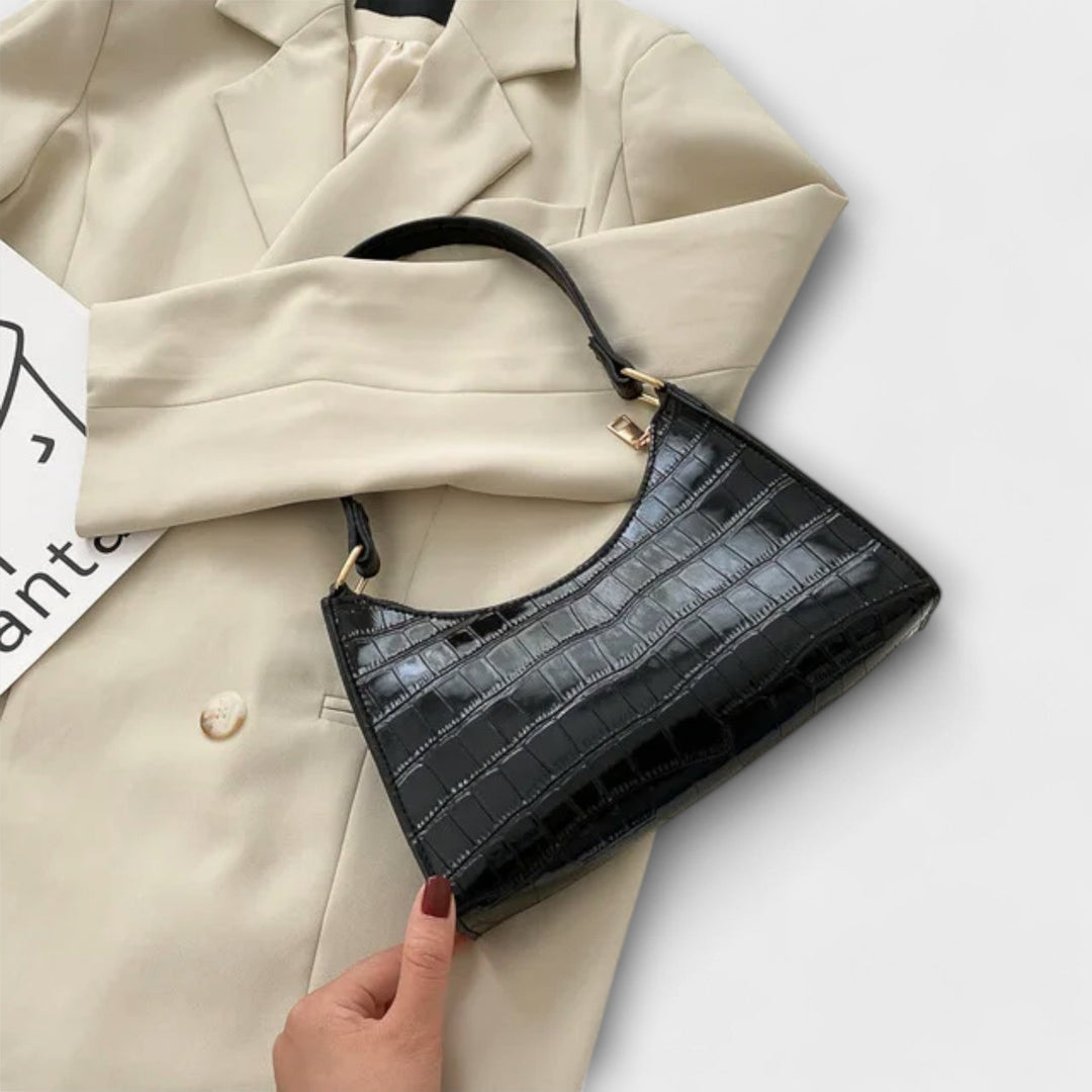 Léora. Glänzendi Ledertasche