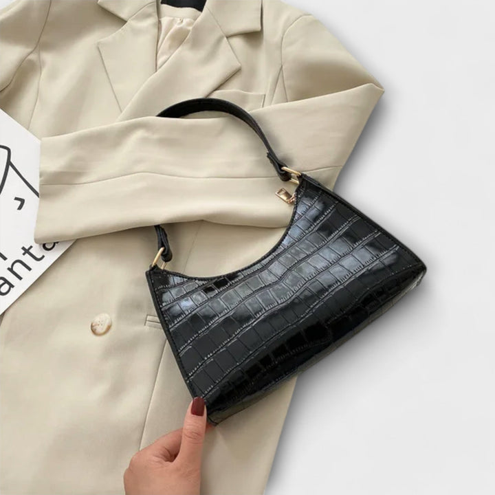 Léora. Glänzendi Ledertasche