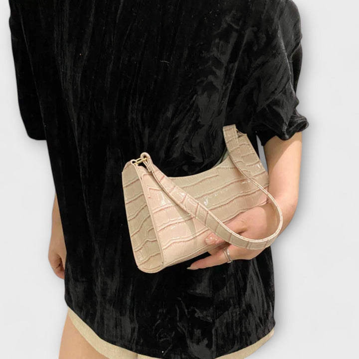 Léora. Glänzendi Ledertasche