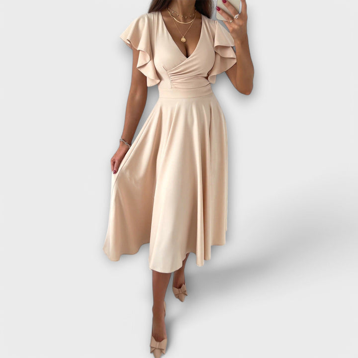 Elegants V-Ausschnitt-Chleid mit fliessender Silhouette